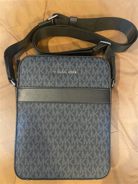 michael kors logo sling bag|Michael Kors sling bag men.